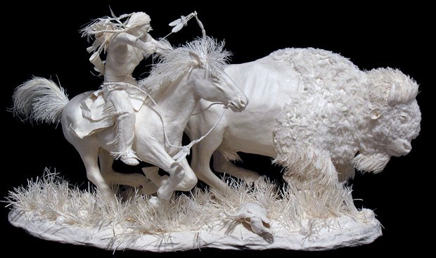 Paper art of Native American indians made by Allen and Patty Eckman