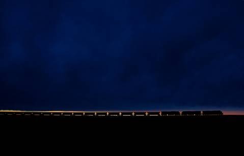 http://twistedsifter.com/2013/03/coal-train-at-sunset-powder-river-basin/