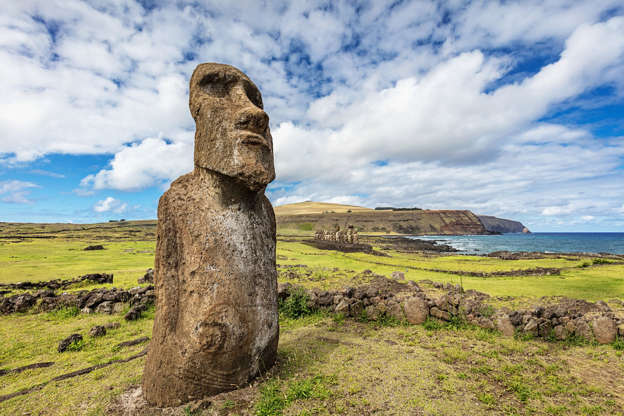 Slide 13 of 31: Easter Island's popularity with tourists belies just how remote it is: a staggering 2,200 miles from the coast of Chile. It's also the closest landmass to Point Nemo, the point in the Pacific Ocean farthest from any land. Still, this small dot in the Pacific draws visitors eager to see the hundreds of mysterious moai, statues carved by indigenous people close to 1,000 years ago.